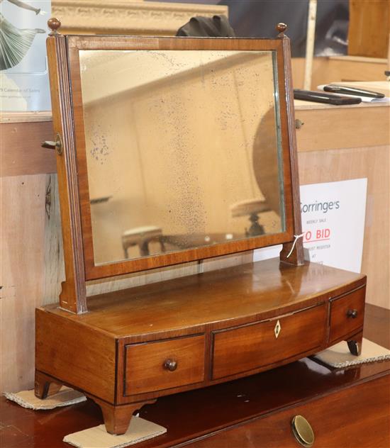 A George III mahogany toilet mirror W.52cm